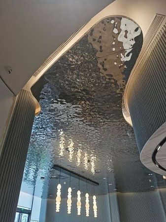 Листы из нержавейки с имитацией ряби на воде - пример выполнения